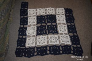 My progress so far on the motif blanket. I have five dark blue squares and the edging left.