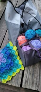 yarn tote with yarn insert and blanket outside the main bag